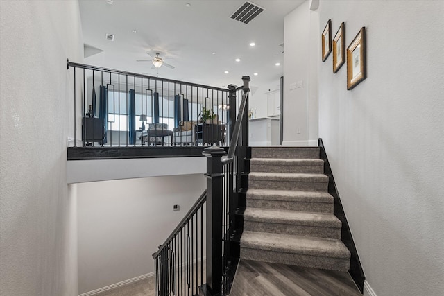 5542 Yellowstone Rd, The Colony, TX 75056 - stairs featuring a ceiling fan, baseboards, wood finished floors, and recessed lighting