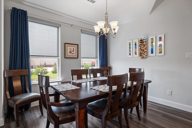 5542 Yellowstone Rd, The Colony, TX 75056 - dining area with a chandelier, baseboards, and dark wood-style floors