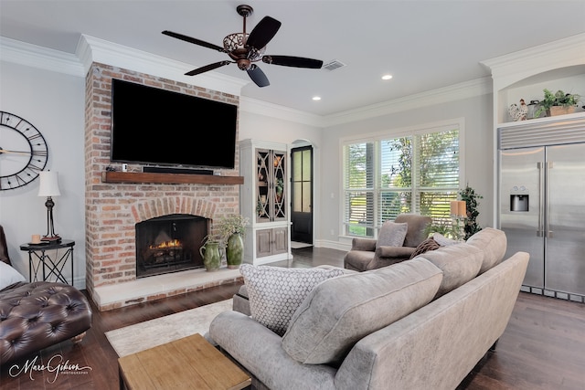152 Sand Beach Blvd, Shreveport, LA 71105 - living area with ceiling fan, wood finished floors, crown molding, a fireplace, and recessed lighting