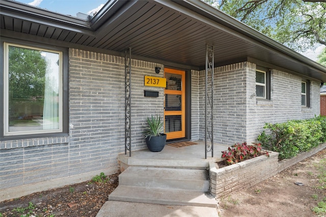 2137 Lenamon St, Waco, TX 76710 - view of exterior entry with brick siding