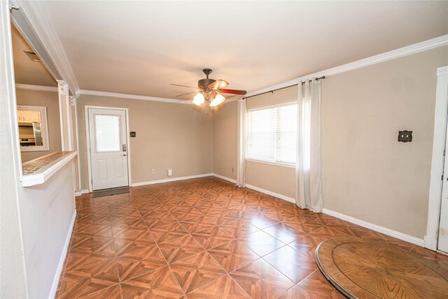 97 Wade St, Nocona, TX 76255 - unfurnished room featuring a ceiling fan, baseboards, and crown molding