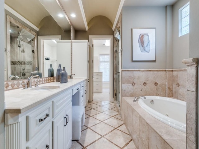 6302 Waggoner Dr, Dallas, TX 75230 - full bath featuring a whirlpool tub, a stall shower, double vanity, and tile patterned floors