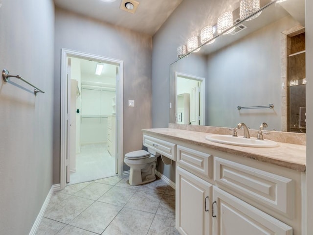 6302 Waggoner Dr, Dallas, TX 75230 - full bathroom featuring tile patterned flooring, toilet, baseboards, and vanity