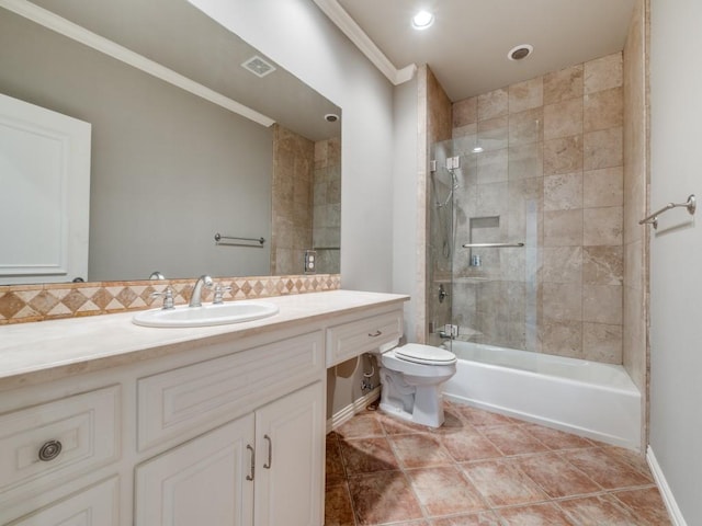 6302 Waggoner Dr, Dallas, TX 75230 - bathroom with toilet, vanity, baseboards, crown molding, and tile patterned floors