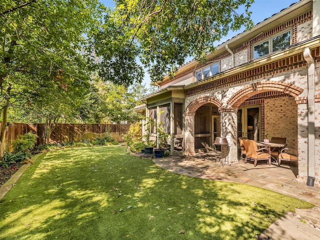6302 Waggoner Dr, Dallas, TX 75230 - back of property featuring brick siding and a patio