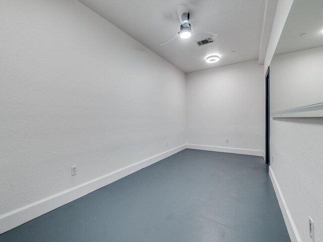 6302 Waggoner Dr, Dallas, TX 75230 - unfurnished room with concrete flooring, a ceiling fan, and baseboards
