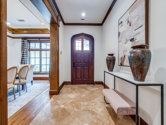 6302 Waggoner Dr, Dallas, TX 75230 - entrance foyer featuring crown molding and baseboards