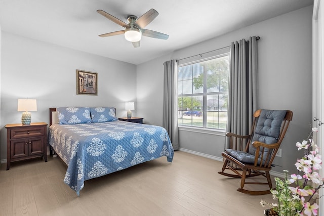 1930 Copper Ridge Cir, Rockwall, TX 75032 - bedroom with baseboards, wood finished floors, and a ceiling fan