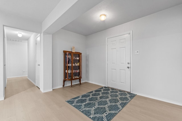 1930 Copper Ridge Cir, Rockwall, TX 75032 - entryway featuring wood finished floors and baseboards