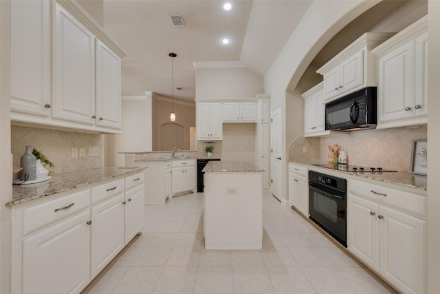 8621 Nichols Way N, Richland Hills, TX 76180 - kitchen with black appliances, decorative backsplash, light stone countertops, lofted ceiling, and light tile patterned floors
