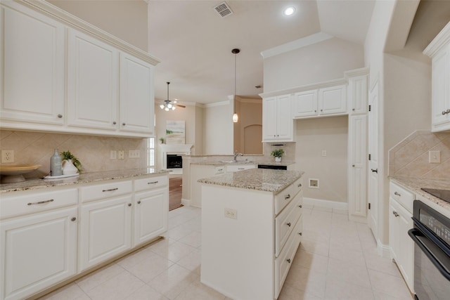8621 Nichols Way N, Richland Hills, TX 76180 - kitchen with black appliances, a ceiling fan, decorative backsplash, light tile patterned floors, and light stone countertops