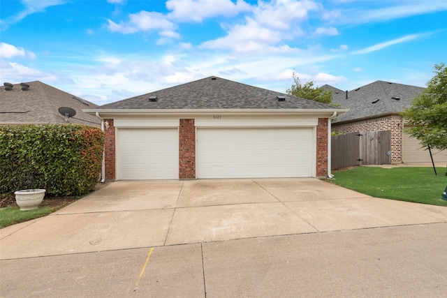 8621 Nichols Way N, Richland Hills, TX 76180 - view of front of home with brick siding, driveway, roof with shingles, and a garage