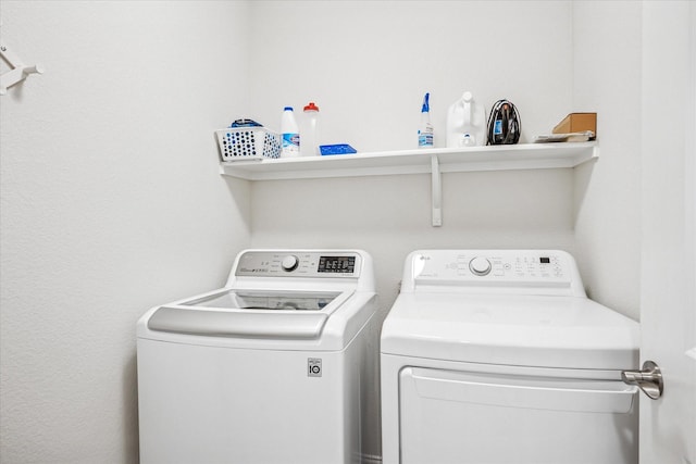 washroom with washer and clothes dryer