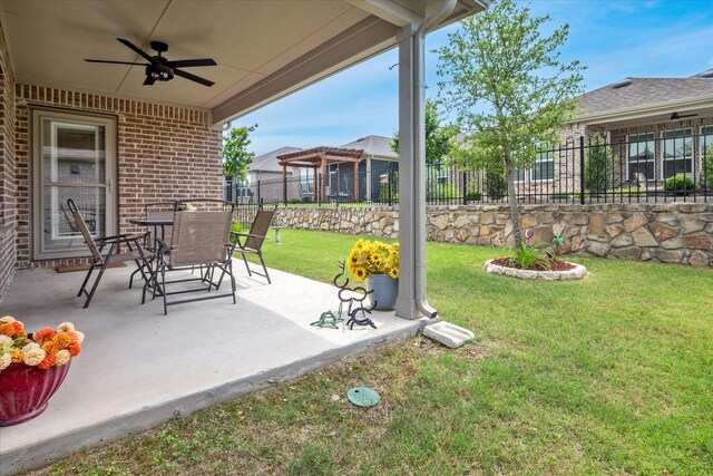 view of patio featuring a ceiling fan and outdoor dining space