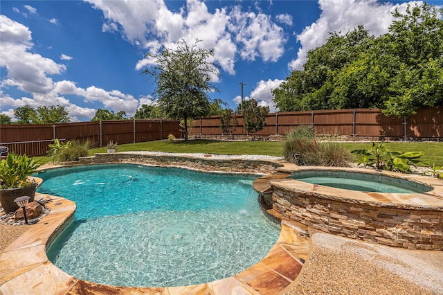 view of swimming pool with a pool with connected hot tub