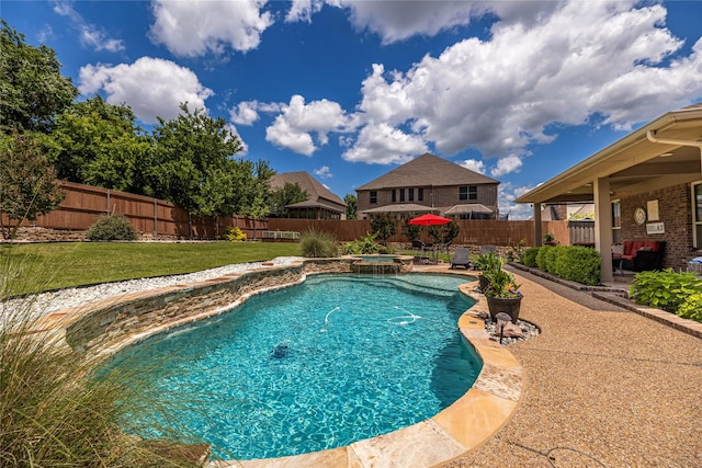 view of swimming pool featuring a patio and a pool with connected hot tub