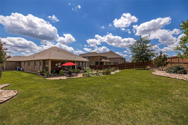 view of yard with a patio area