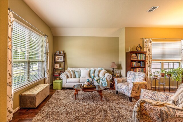 living room with dark wood-style floors and baseboards
