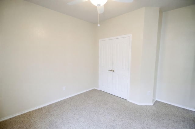 708 Flora Vista Ct, Arlington, TX 76002 - unfurnished bedroom with carpet flooring, a closet, baseboards, and ceiling fan