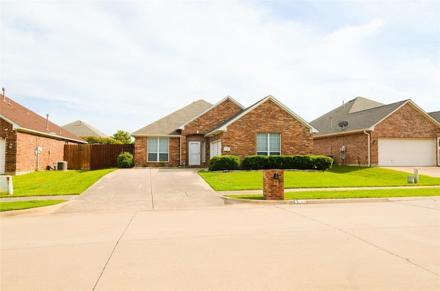 708 Flora Vista Ct, Arlington, TX 76002 - traditional-style house featuring brick siding, cooling unit, driveway, and a shingled roof