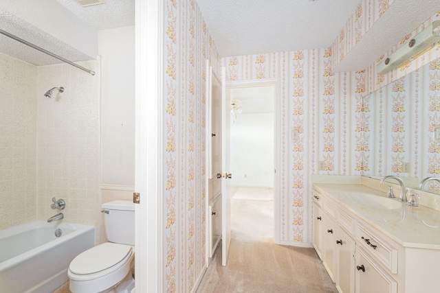 full bath featuring a textured ceiling, toilet, vanity, shower / washtub combination, and baseboards