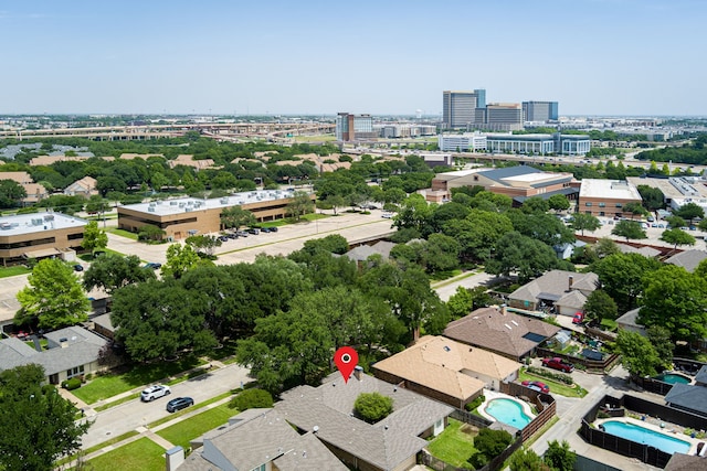 view of urban area with a pool area