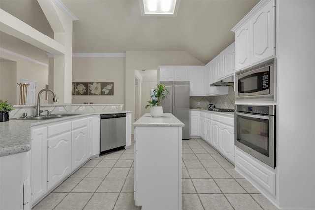 1424 Greenwich Dr, Allen, TX 75013 - kitchen featuring appliances with stainless steel finishes, a sink, under cabinet range hood, decorative backsplash, and a kitchen island