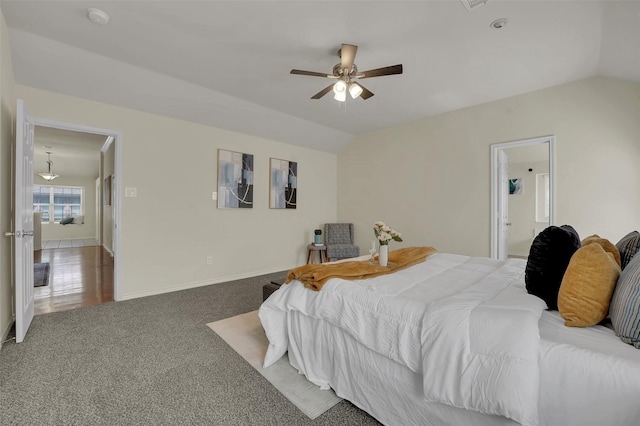 1424 Greenwich Dr, Allen, TX 75013 - carpeted bedroom with vaulted ceiling, baseboards, a ceiling fan, and ensuite bathroom