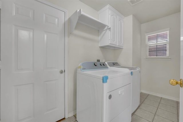 1424 Greenwich Dr, Allen, TX 75013 - washroom with washing machine and dryer, cabinet space, baseboards, and light tile patterned floors