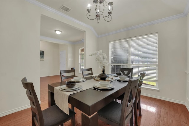 1424 Greenwich Dr, Allen, TX 75013 - dining space with a chandelier, plenty of natural light, baseboards, wood finished floors, and ornamental molding