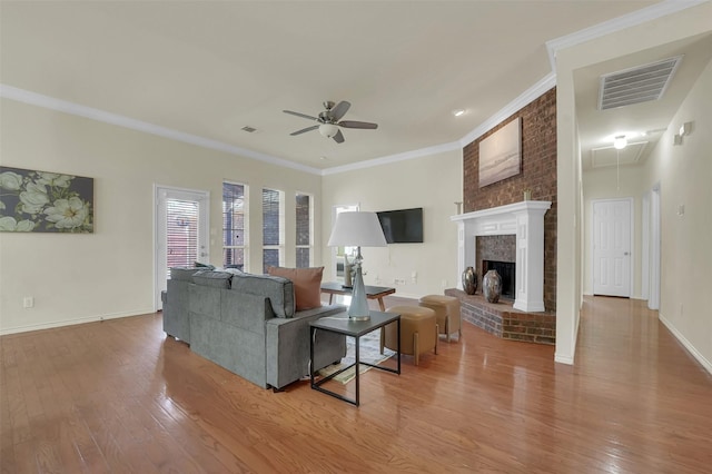 1424 Greenwich Dr, Allen, TX 75013 - living room with attic access, ceiling fan, hardwood / wood-style floors, ornamental molding, and baseboards
