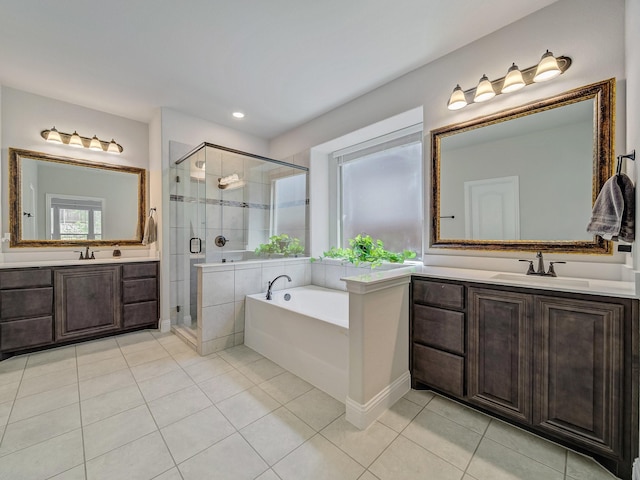 1316 Brentfield Dr, Anna, TX 75409 - bathroom featuring tile patterned flooring, a shower stall, two vanities, a bath, and recessed lighting