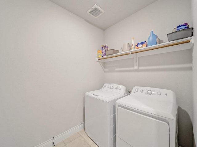 1316 Brentfield Dr, Anna, TX 75409 - clothes washing area featuring separate washer and dryer, baseboards, and light tile patterned flooring