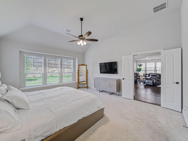 1316 Brentfield Dr, Anna, TX 75409 - carpeted bedroom featuring multiple windows, high vaulted ceiling, and a ceiling fan
