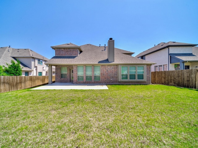 1316 Brentfield Dr, Anna, TX 75409 - back of house featuring a patio, a chimney, brick siding, and a shingled roof