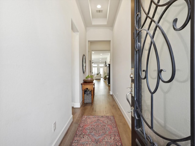 1227 Rushcroft Way, Forney, TX 75126 - entryway with light wood-style flooring, baseboards, and a tray ceiling
