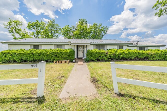 9820 County Road 514, Alvarado, TX 76009 - single story home featuring a front yard and metal roof