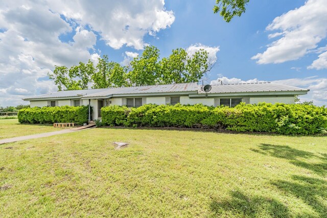 9820 County Road 514, Alvarado, TX 76009 - ranch-style home with a front lawn and metal roof