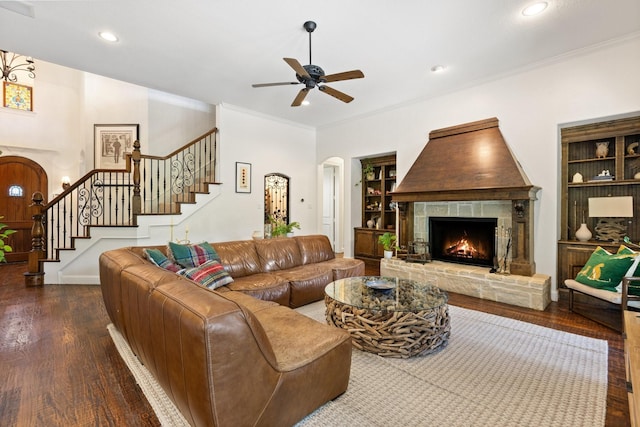 1480 Snider Ct, Lucas, TX 75002 - living room with a fireplace, arched walkways, stairway, wood finished floors, and ceiling fan