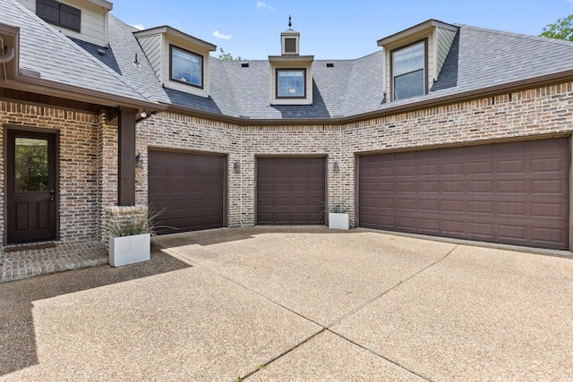 1480 Snider Ct, Lucas, TX 75002 - view of front of home with driveway, a garage, brick siding, and roof with shingles