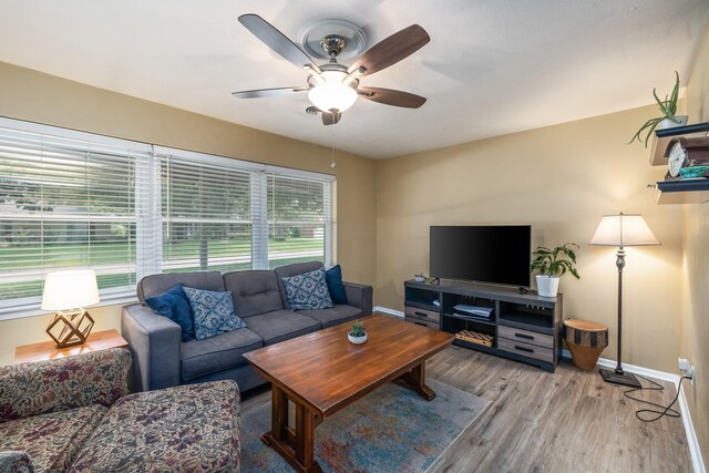 1809 Esquire Pl, Grand Prairie, TX 75050 - living area featuring ceiling fan, baseboards, and wood finished floors