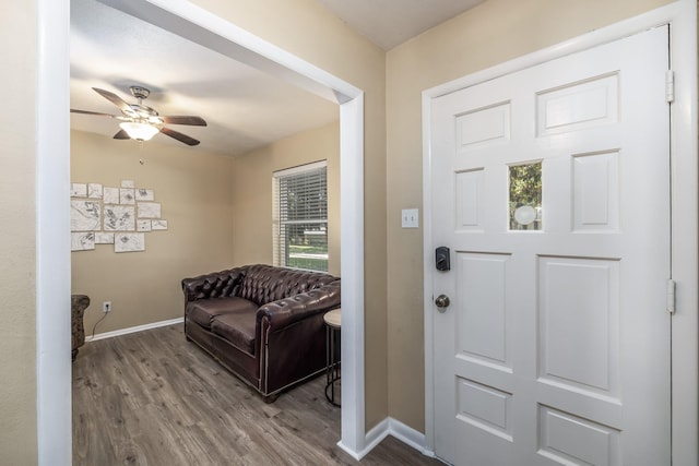 1809 Esquire Pl, Grand Prairie, TX 75050 - foyer entrance with baseboards, wood finished floors, and a ceiling fan