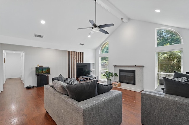 6801 Sweetwater Dr, Plano, TX 75023 - living room featuring a fireplace with flush hearth, high vaulted ceiling, beam ceiling, ceiling fan, and dark wood finished floors