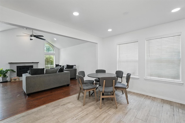 6801 Sweetwater Dr, Plano, TX 75023 - dining room featuring wood finished floors, lofted ceiling, a ceiling fan, recessed lighting, and baseboards