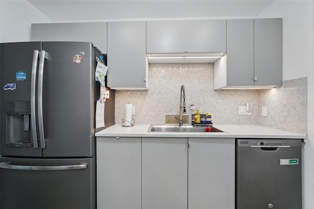 6801 Sweetwater Dr, Plano, TX 75023 - kitchen with stainless steel fridge, dishwashing machine, a sink, light countertops, and tasteful backsplash