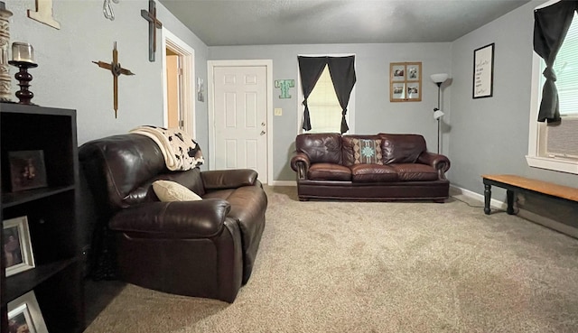 310 W Russell St, Weatherford, TX 76086 - living area with carpet floors and baseboards