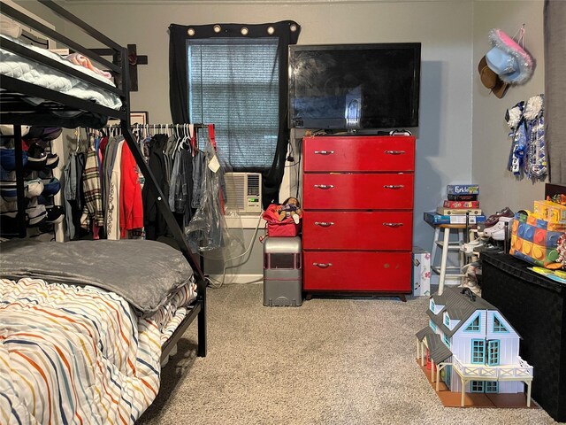 310 W Russell St, Weatherford, TX 76086 - bedroom with carpet floors and cooling unit