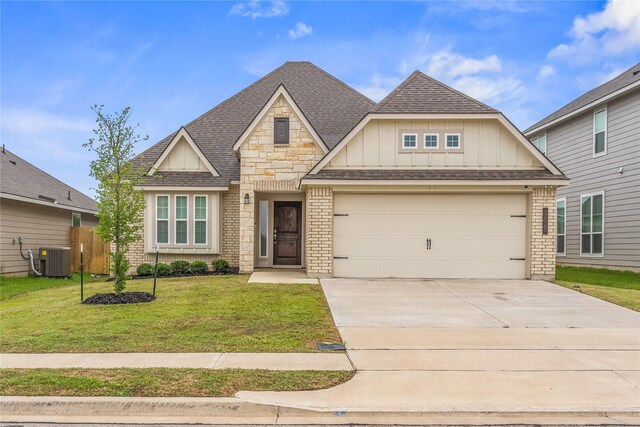 3625 Beutel Rd, Waco, TX 76655 - craftsman-style house featuring roof with shingles, board and batten siding, concrete driveway, and a front yard