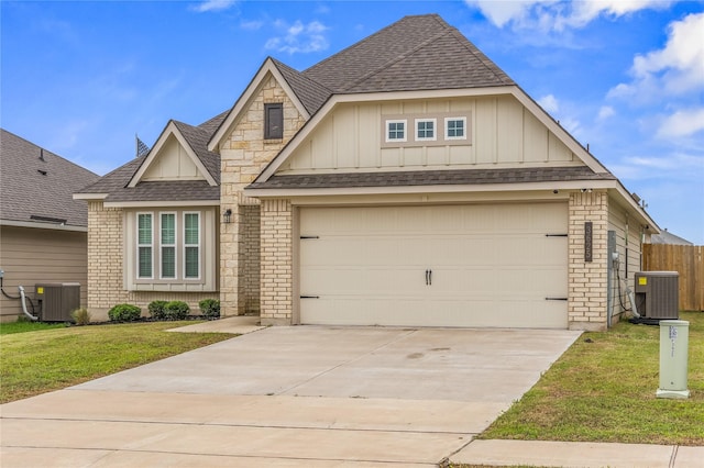 3625 Beutel Rd, Waco, TX 76655 - view of front of home featuring roof with shingles, cooling unit, board and batten siding, and brick siding