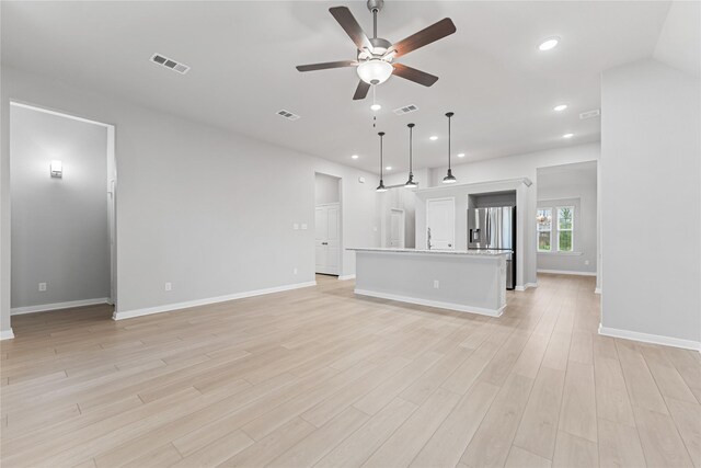 3625 Beutel Rd, Waco, TX 76655 - unfurnished living room featuring a ceiling fan, recessed lighting, baseboards, and light wood finished floors